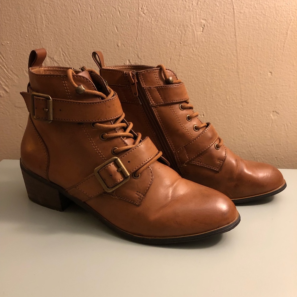 Lace up ankle boots with buckle straps